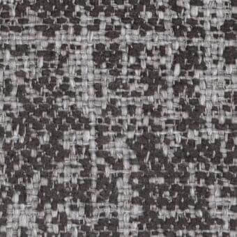 Woven tweed-like fabric with charcoal and light gray tones, speckled pattern, dense texture, and visible vertical/horizontal threads; Constantini Pietro l95.